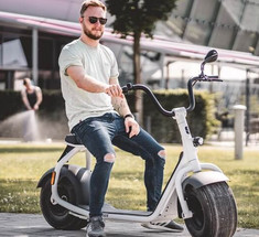Электрический скутер Scrooser: комфортное путешествие сделанное в Германии